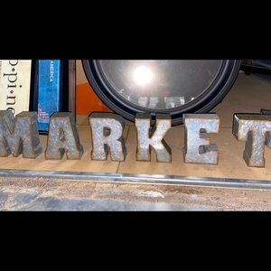 6 inch tall metal letters that spell out MARKET